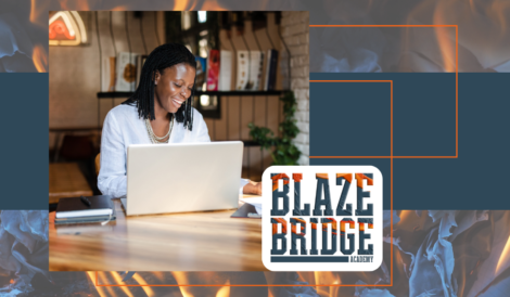 African American woman sits on her laptop while she studies how to become a social media manager with Blazebridge Academy.