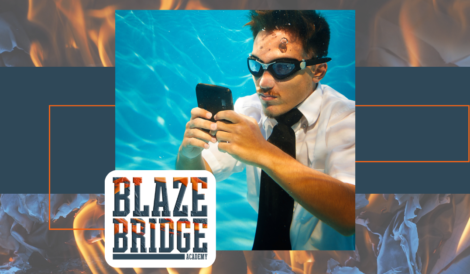 Man swimming underwater while studying his social media qualification with Blazebridge Academy