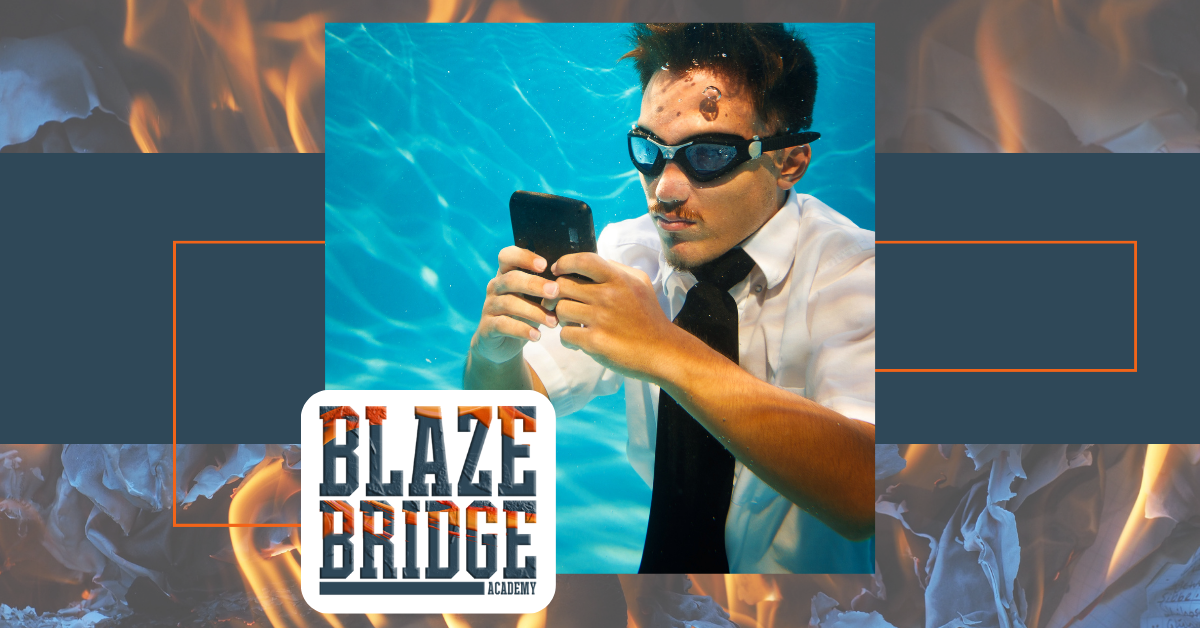 Man swimming underwater while studying his social media qualification with Blazebridge Academy